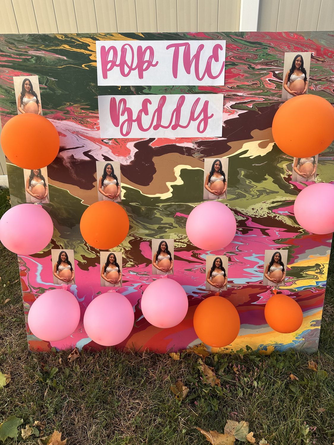 Pop the Belly balloon game board at a baby shower