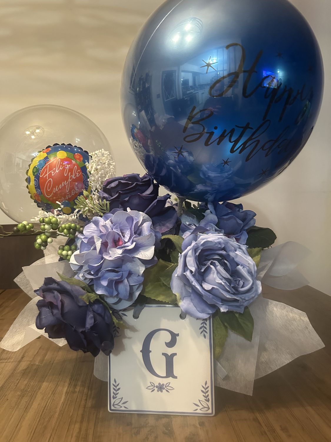 Blue floral and bubble balloon centerpiece with monogram